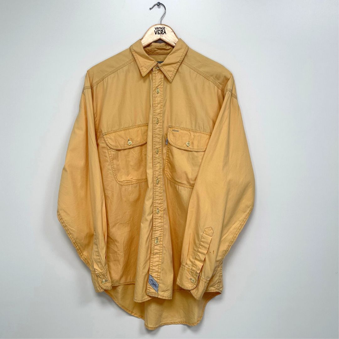 Levis store yellow shirt